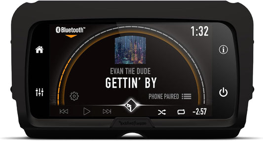 A Rockford Fosgate Canada PMX-HD14 motorcycle infotainment source unit featuring a 7-inch full color LCD display with built-in Apple Car Play, Bluetooth connectivity, and a view of a smartphone's screen on the display.